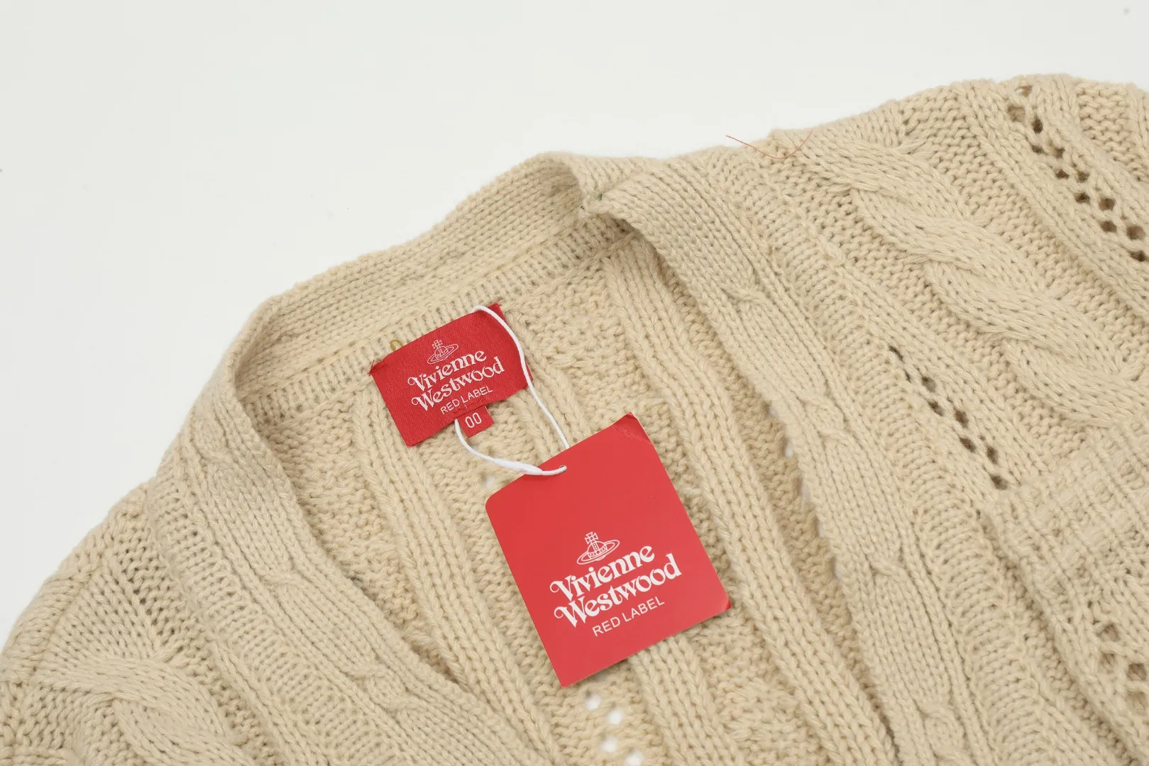 vivienne west wood West Queen Vivian Saturn New Retro "Unisex" Hollow Knitted Sweater Wool Cardigan 2024 Spring Latest Style Size: S -M- L Color: Apricot Black